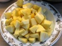 Peel the apples and cut them into cubes. Drizzle...
