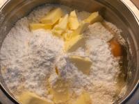 Add cutted butter, sugar and eggs to the flour....