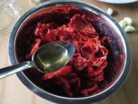 Put the tomatoes in a bowl, cover with a teaspoon...