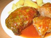 Stuffed cabbage leaves with tomato sauce