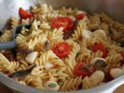 Pasta salad with mozzarella and rolled anchovy eyes