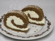 Gingerbread roll with whipped cream