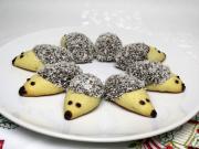 Christmas cookies in the shape of hedgehog with plums